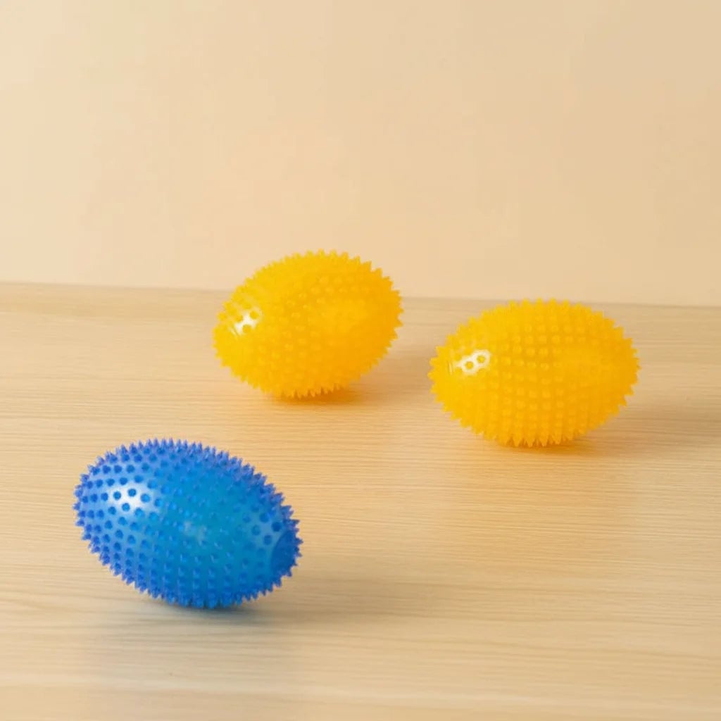 Chew Resistant Olive Spike Dog Ball - Squeaky Teeth Cleaning Toy